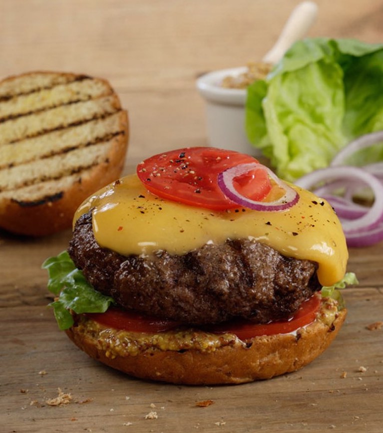 Burger with tomato and cheese